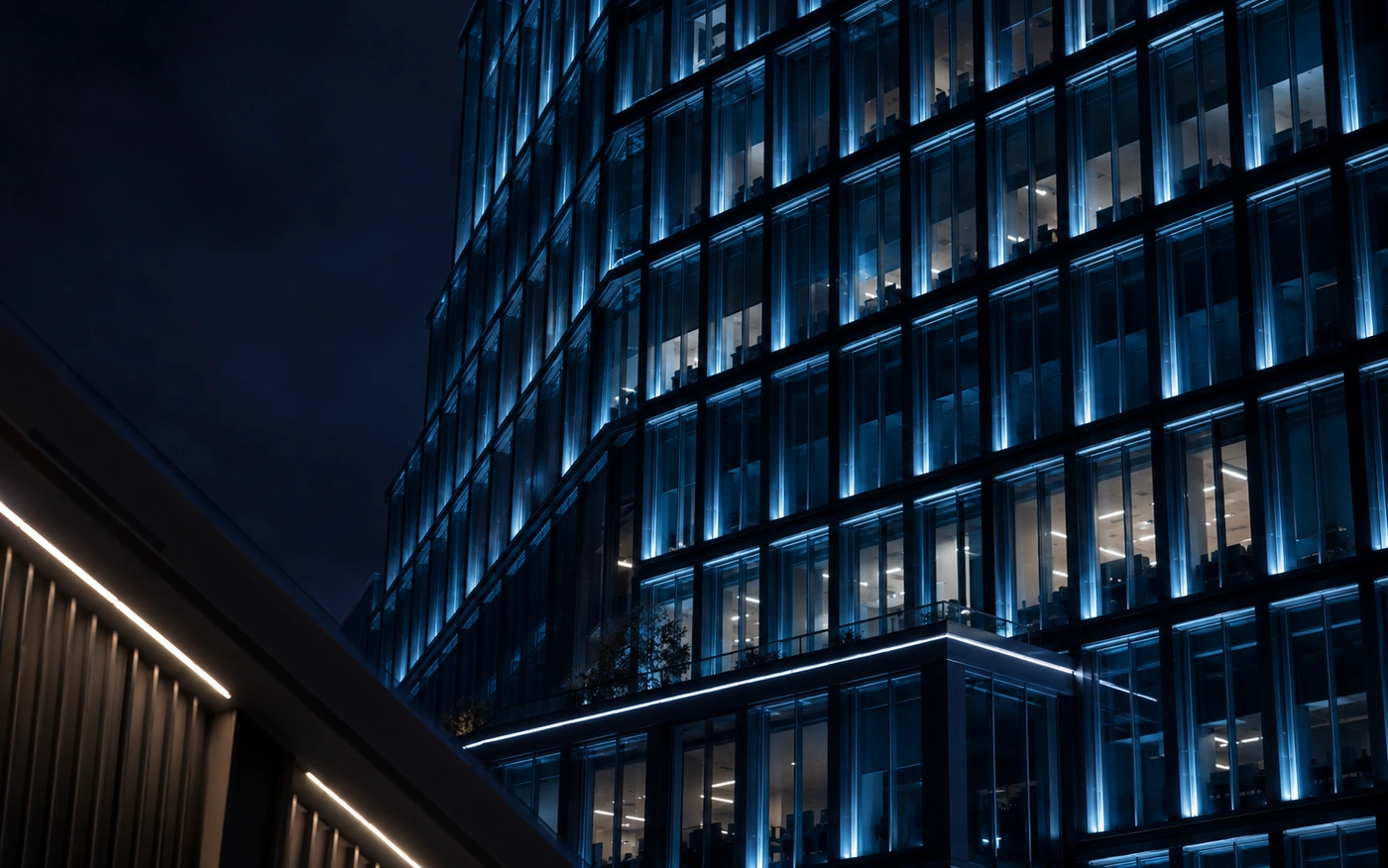 Illuminated window facade detail at night