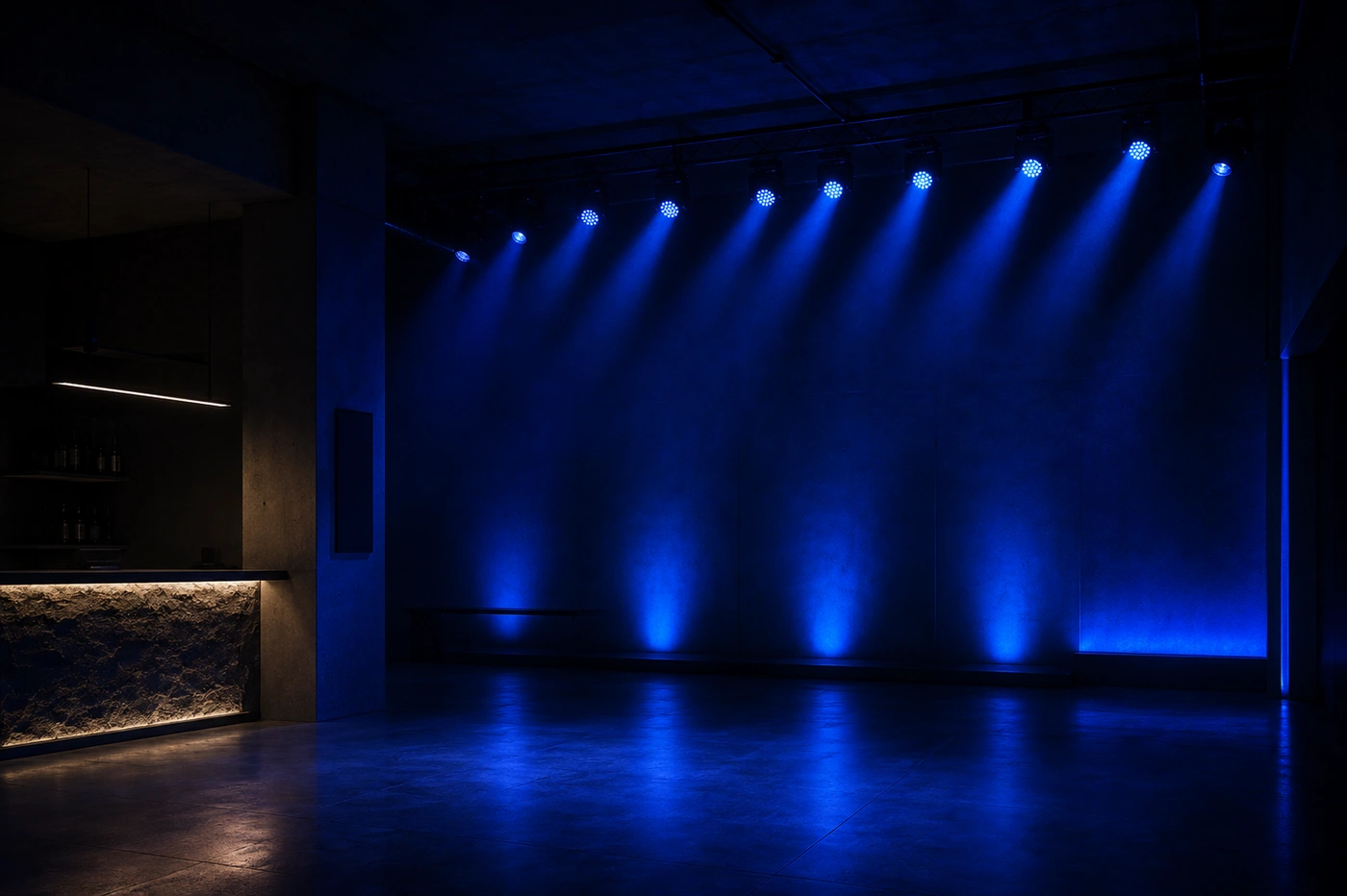 Event stage with blue lighting and haze